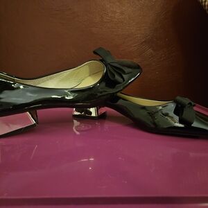 Glossy Black Women's Flats with Bow Detail